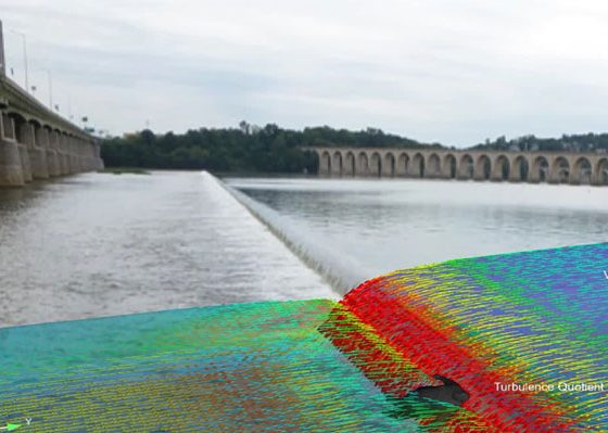 Low head dam with computer model overlay