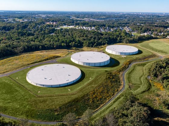 An aerial view of the Fullerton Reservoirs Water Storage Tanks with the community in the background.