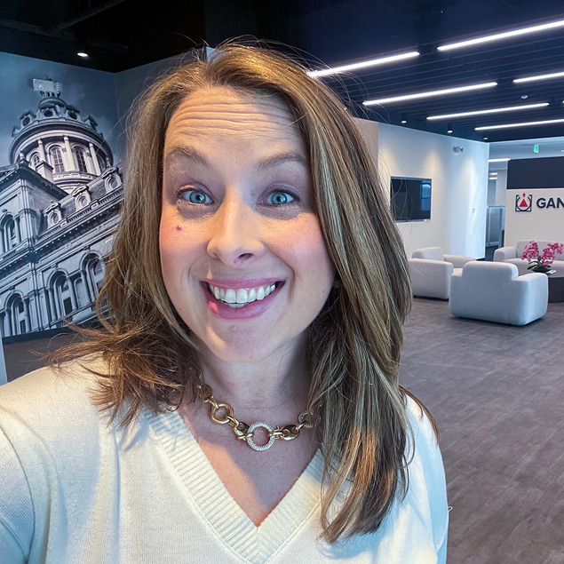 A selfie of Cathy in the lobby of her office.