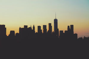 Silhouette of the New York City skyline at sunset