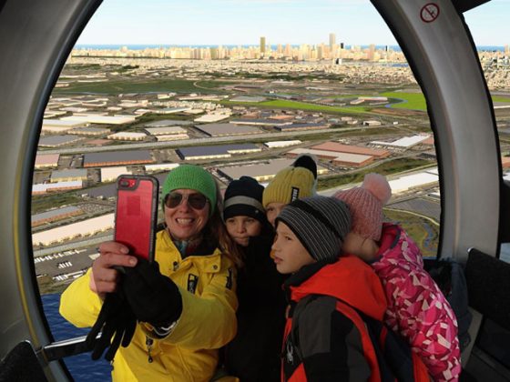 Students enjoy views of New York City and take a selfie while riding a gondola.